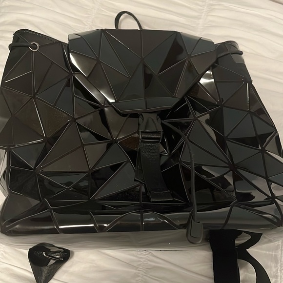 Emilio Pepe Handbags - Emilio Pepe backpack.  EUC. Drawstring and snap closure